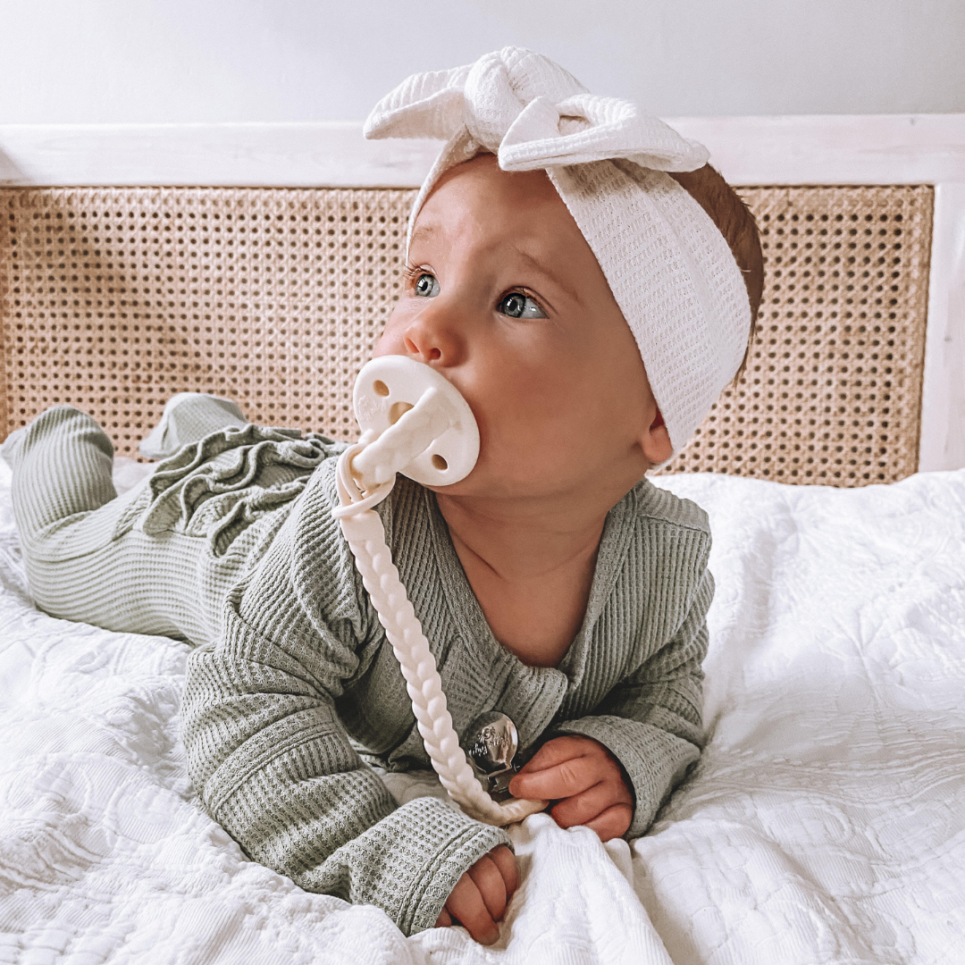 *NEW SIZE* Sweetie Soother™ Pacifier Sets (2-pack): Toast + Buttercream Braids