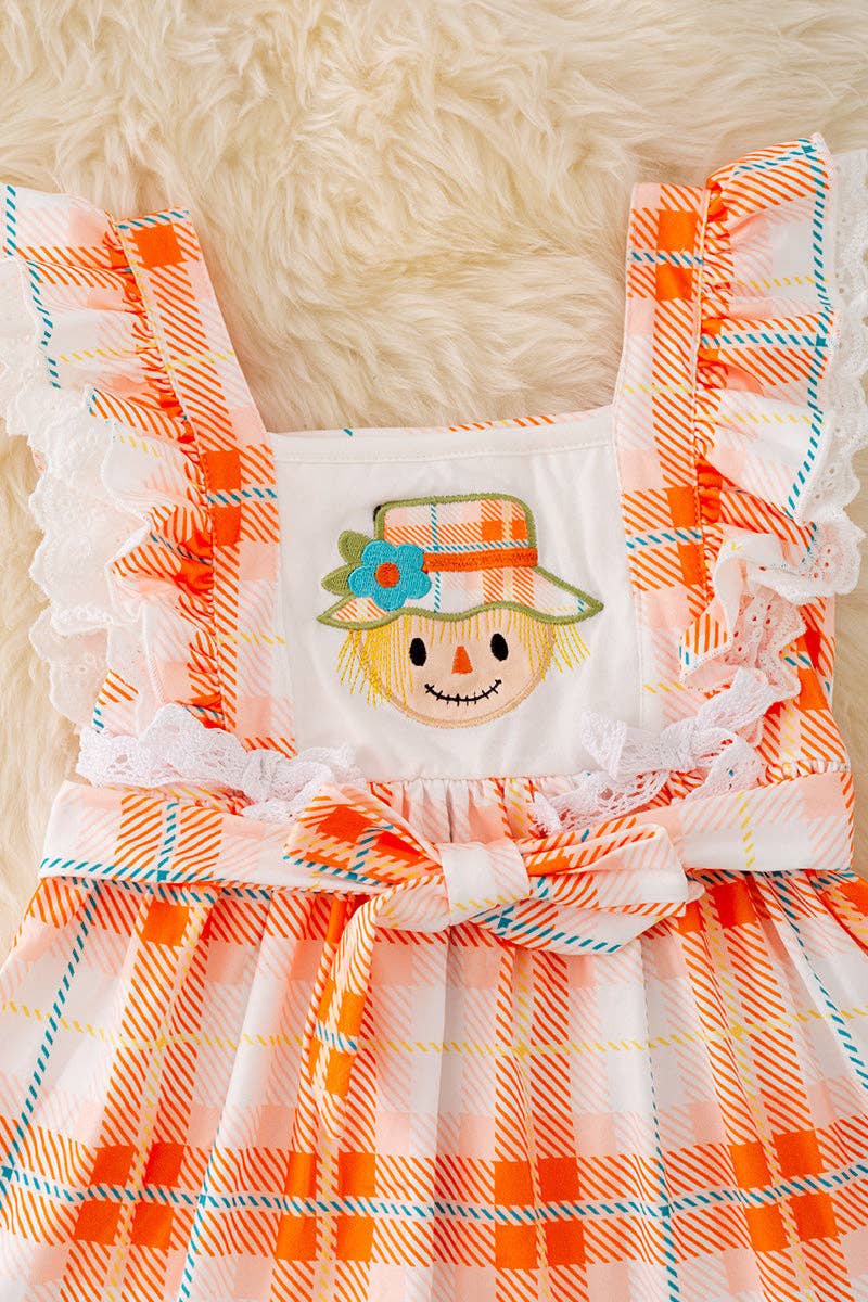 Scarecrow applique dress with embroidered hem. DRG41559 AMY: XL