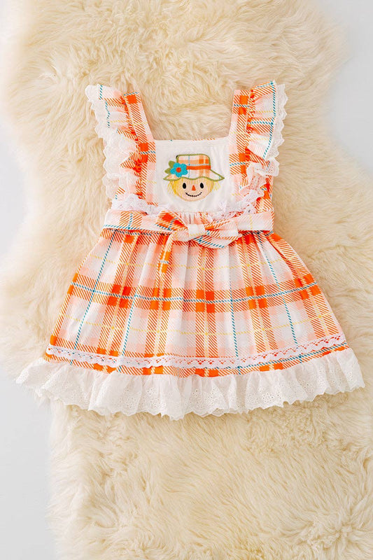 Scarecrow applique dress with embroidered hem. DRG41559 AMY: S